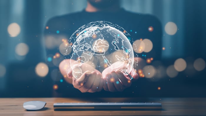 businessman holding Global network connection. Big data analytics and business intelligence concept.