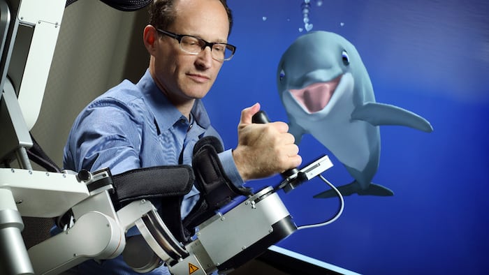 CMO John Krakauer demonstrating MindMaze's Bandit product