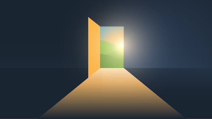Dark room with light coming through an open door